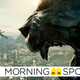 An obsidian panther statue looks out as ships fly over the capital city of Wakanda, Birnin Zana, in Marvel's Black Panther film.